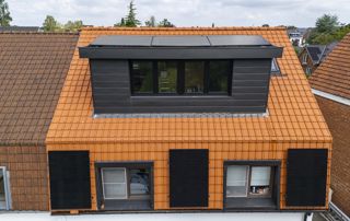 toiture en tuiles avec chien assis
