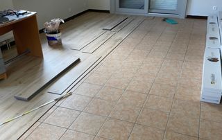 pose de parquet sur carrelage