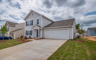 allée de garage d'une grande maison